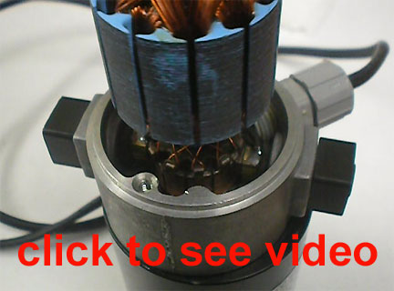 showing motor brushes with rotor removed in a brush motor